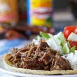 Make this slow cooker coffee barbacoa beef the next time you are in the mood for tacos, burritos or quesadillas! If you’re looking for game day recipes, this is the perfect dinner! | honeyandbirch.com