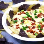 If you like cheese dips, this chipotle bacon corn cheese dip recipe is going to make you so happy! Baked in the oven with three different types of cheese, it's creamy and delicious.