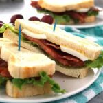 This deviled egg BLT sandwich is the perfect lunch. Make small-batch deviled eggs on demand with this recipe and enjoy your favorite sandwich at the same time! | honeyandbirch.com