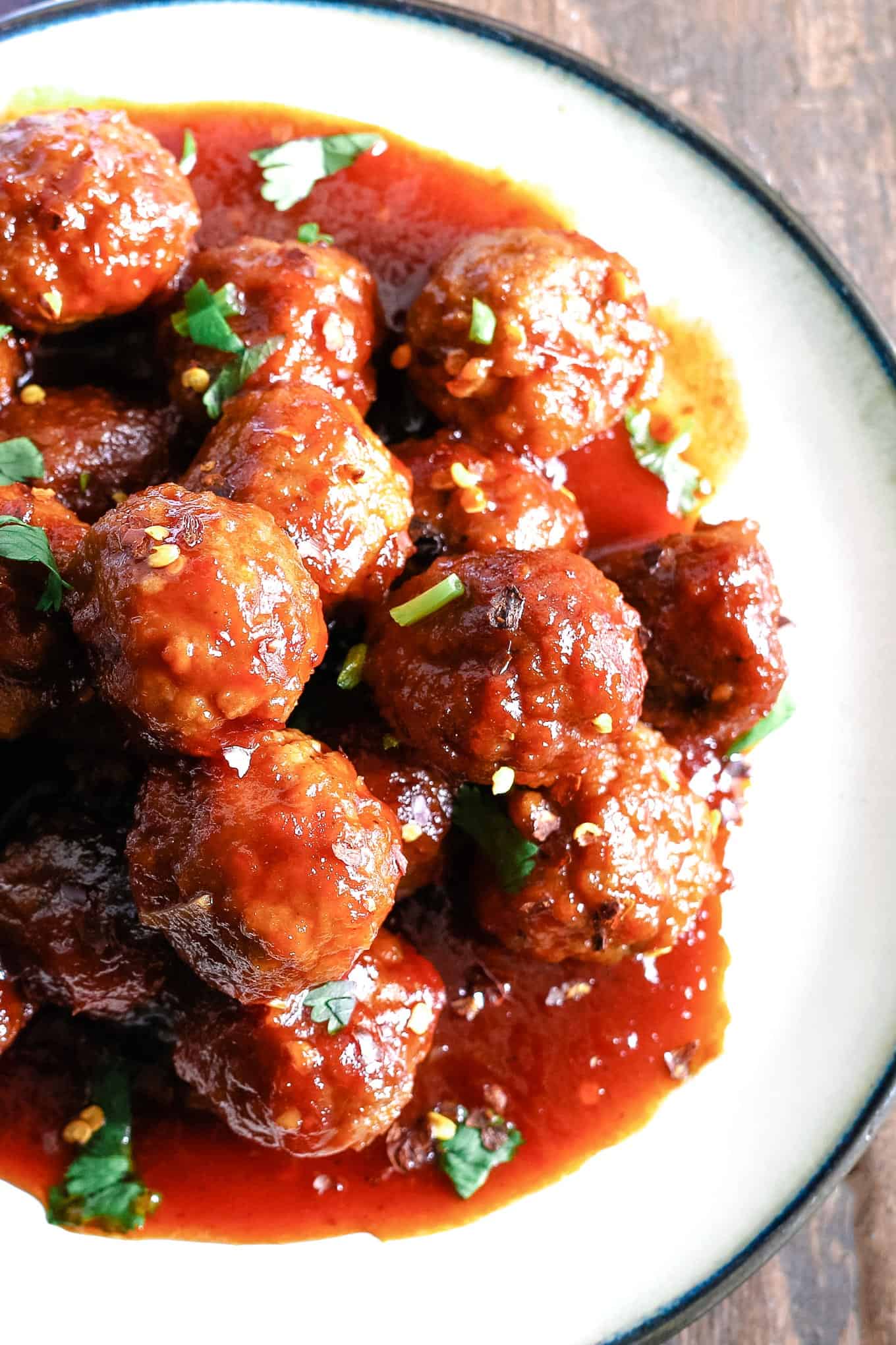 Slow Cooker Sweet and Spicy Meatballs » The Thirsty Feast by honey and ...